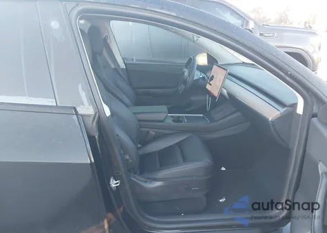 2022 Tesla Model Y Performance Dual Motor All-Wheel Drive z USA, uszkodzony, nr VIN 7SAYGDEFXNF341730